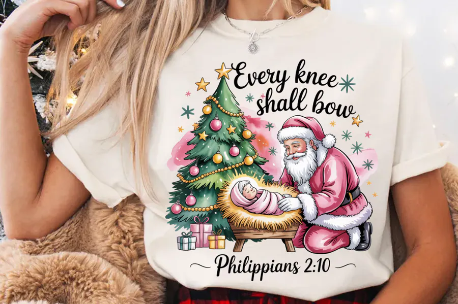 Santa beside baby Jesus with a Christmas tree and Every knee shall bow lettering