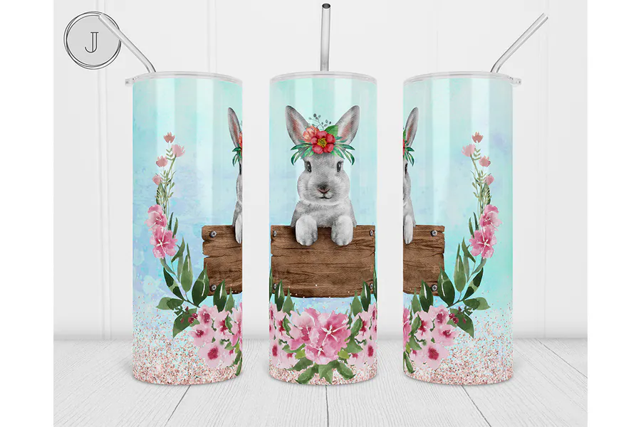 Floral-crowned Easter bunny on a pale blue 20 oz tumbler wrap